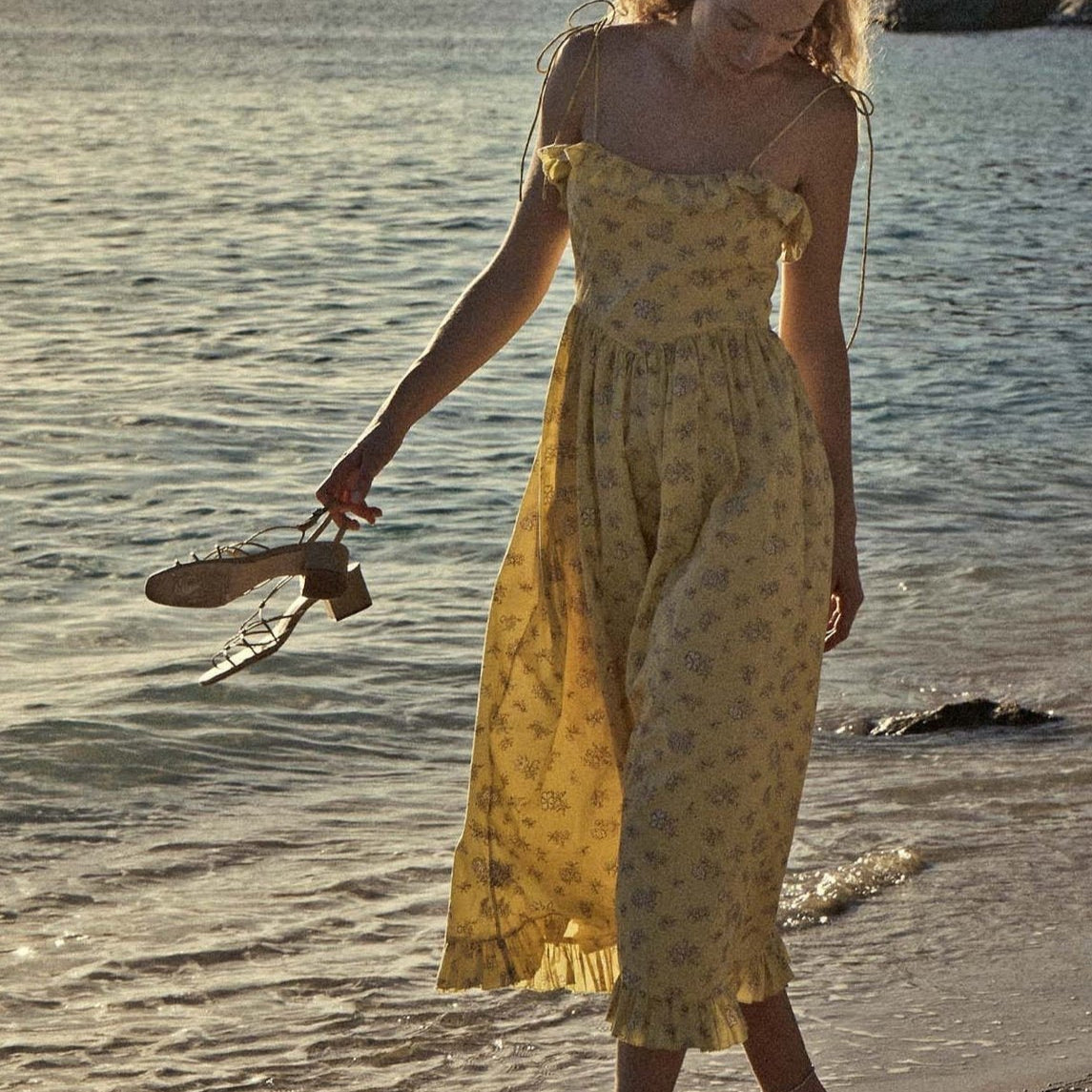 Zomerse maxi jurk met speelse bloemenprint