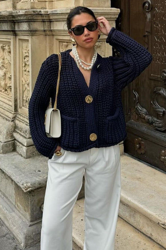 Kort vest met grote knopen