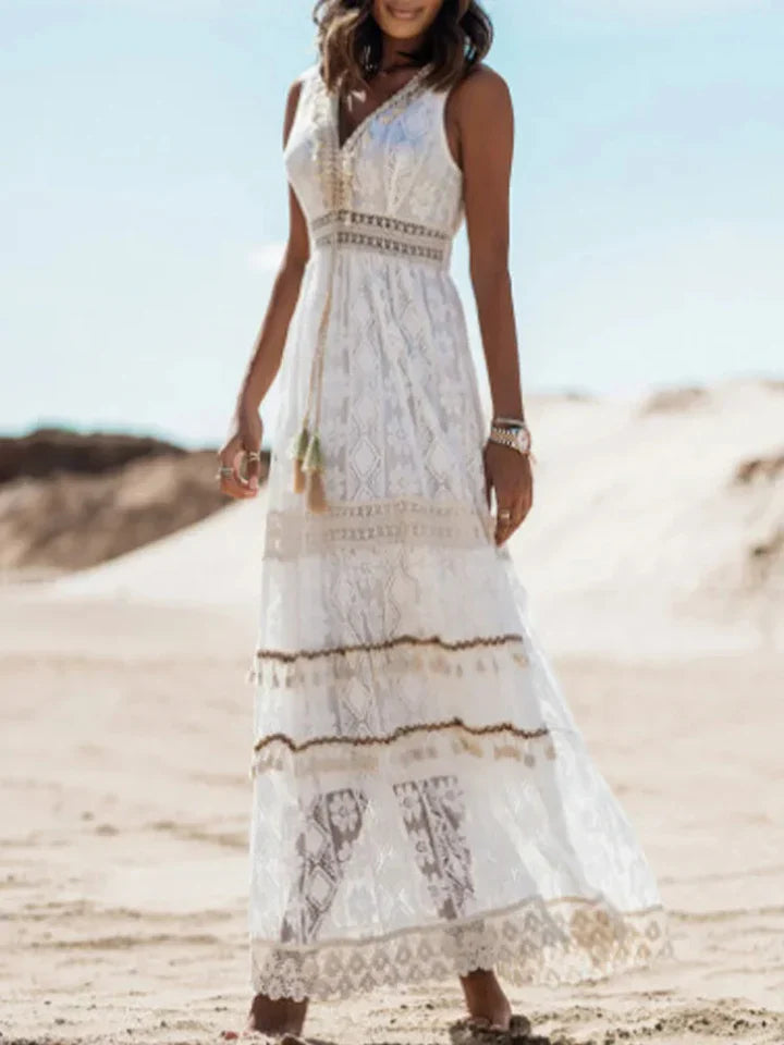 Bohemian maxi-jurk met kant en elegante uitlopende mouwen