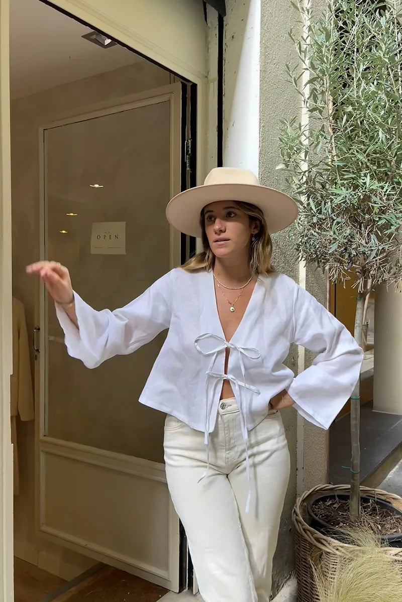 Blouse met lange mouw en striksluiting