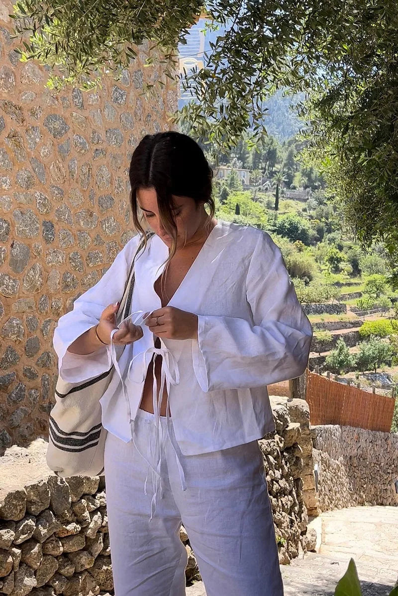 Blouse met lange mouw en striksluiting