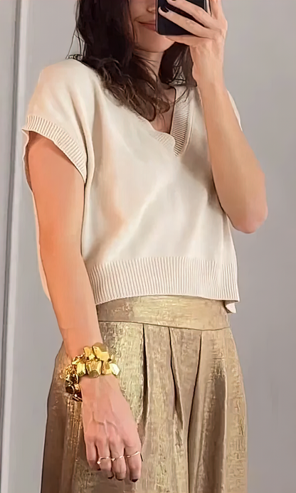 Top met V-hals en broek met wijde pijpen