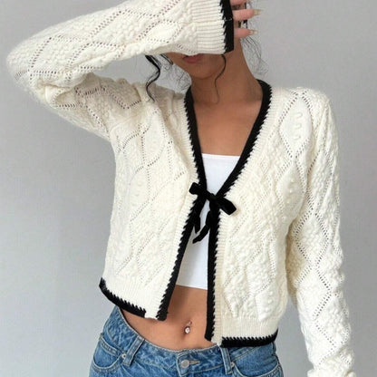 Chique vest met Strik