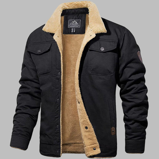 Zwarte heren bomberjack met beige sherpa voering, knoopsluiting en borstzakken. Winterjas, warme kleding, modieuze herenkleding.