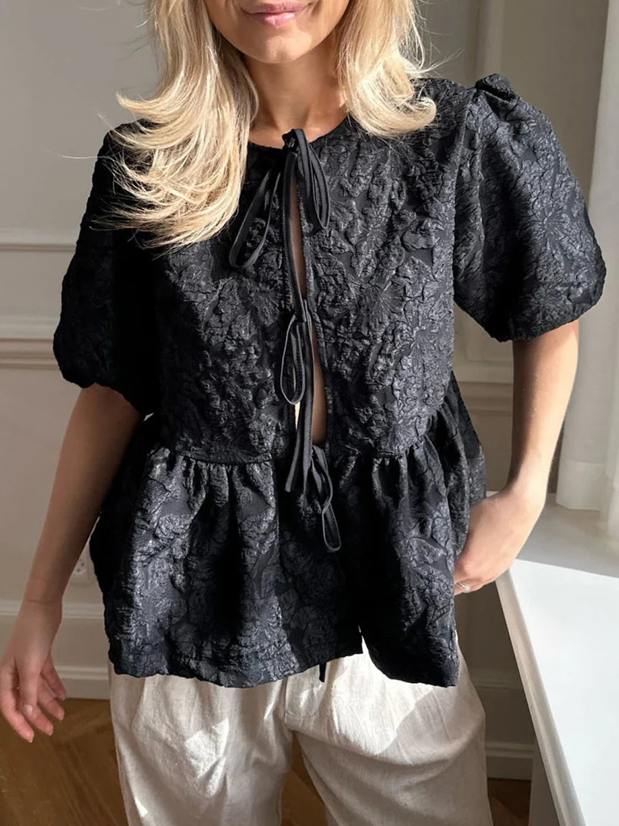 Blouse met textuur en strik