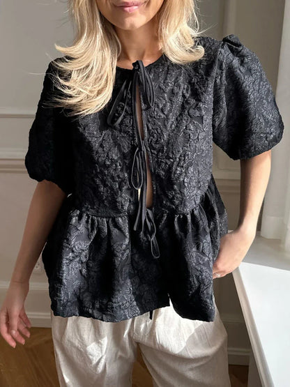 Blouse met textuur en strik