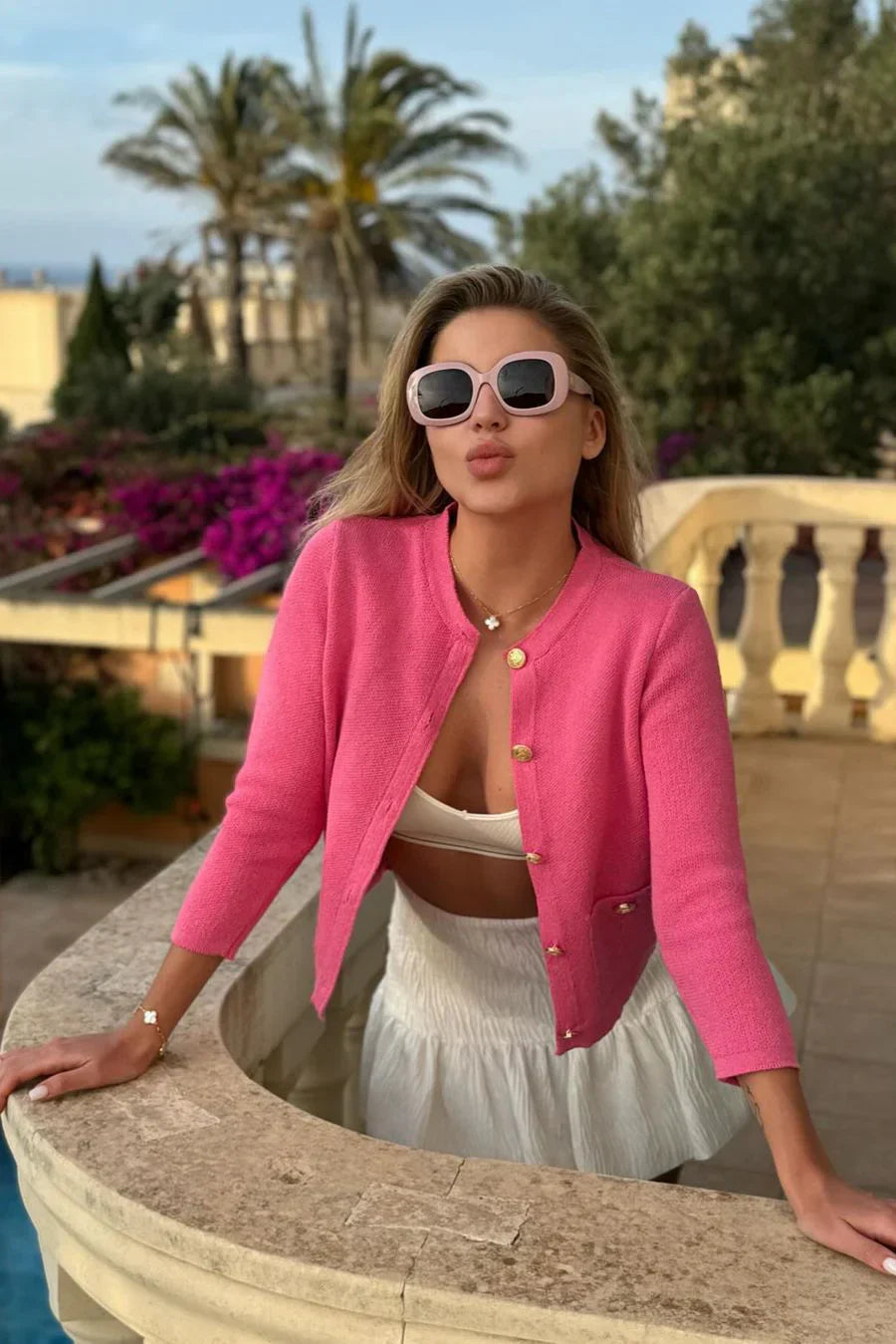 Gebreid vest met zakken en knopen